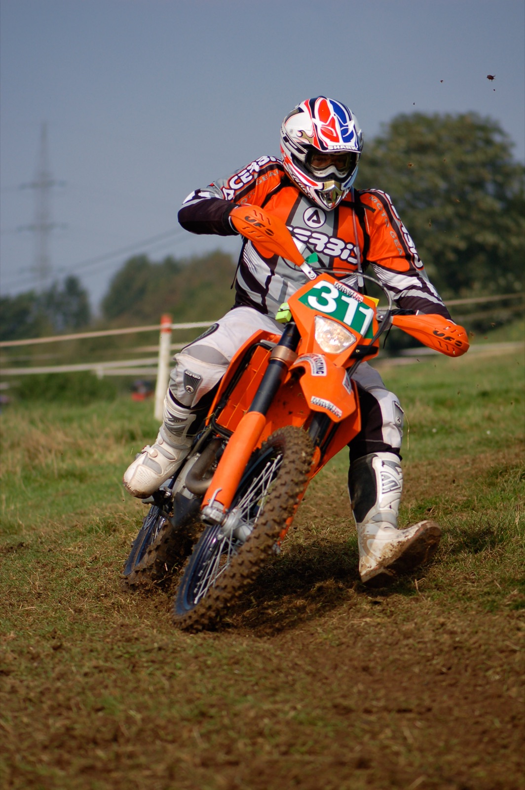 A rider on a 2007 KTM 525 EXC Racing, number 311, at an enduro